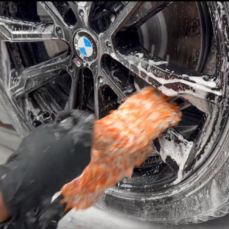 Fox Tail wheel detailing mitt shocased in action, showing gloved hands